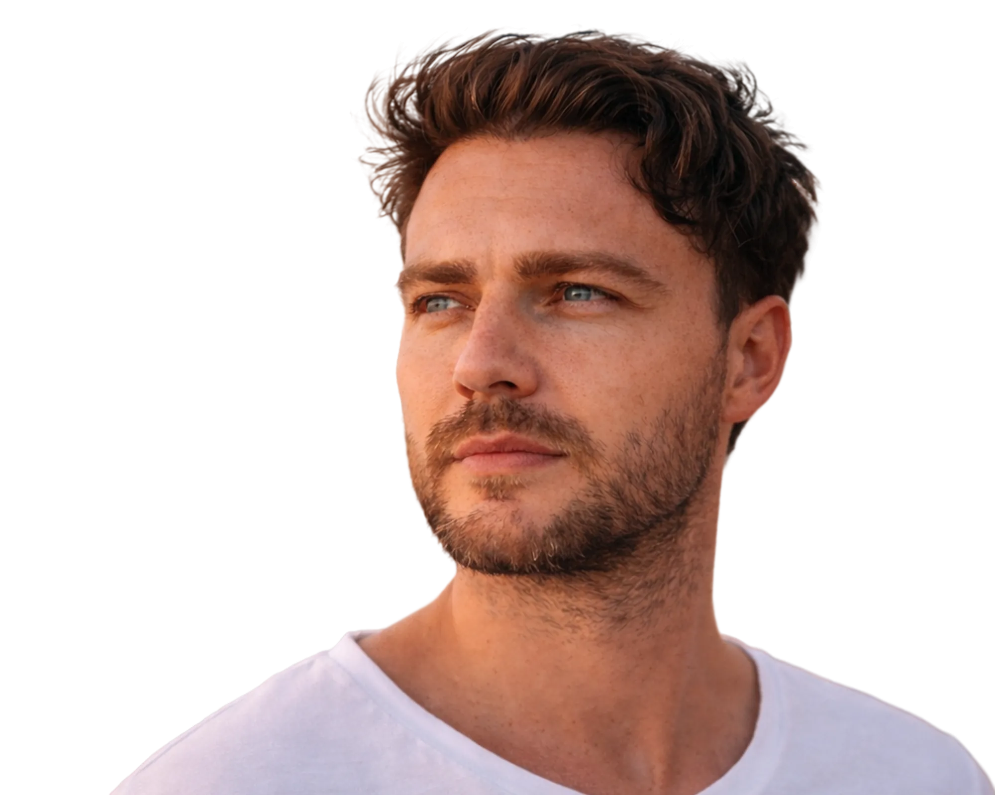 Portrait of a man with thick, natural-looking hair and a groomed beard