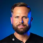 Thumbnail of a man with a beard and styled hair transplant results